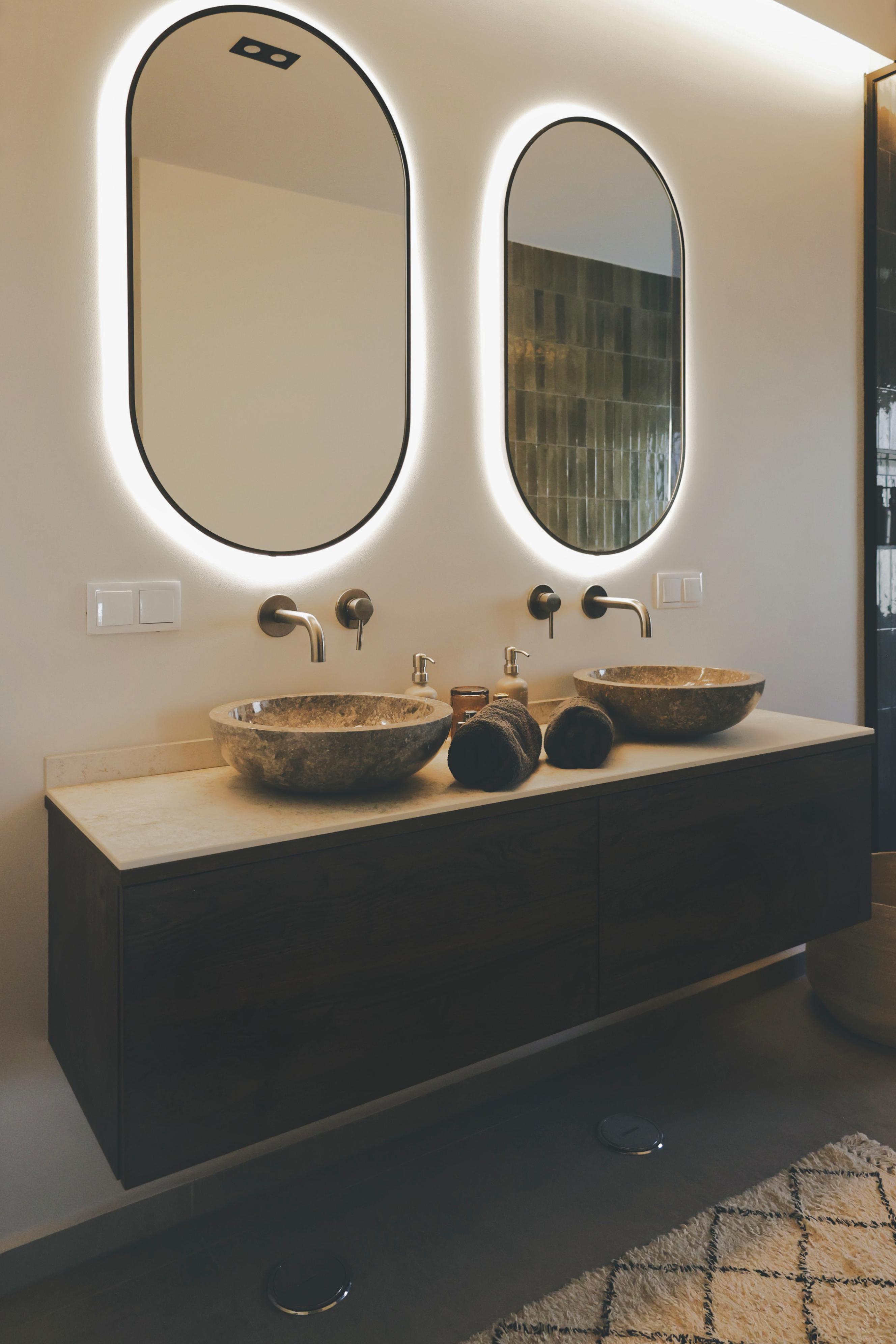 Subtle workshop photograph behind the contact card